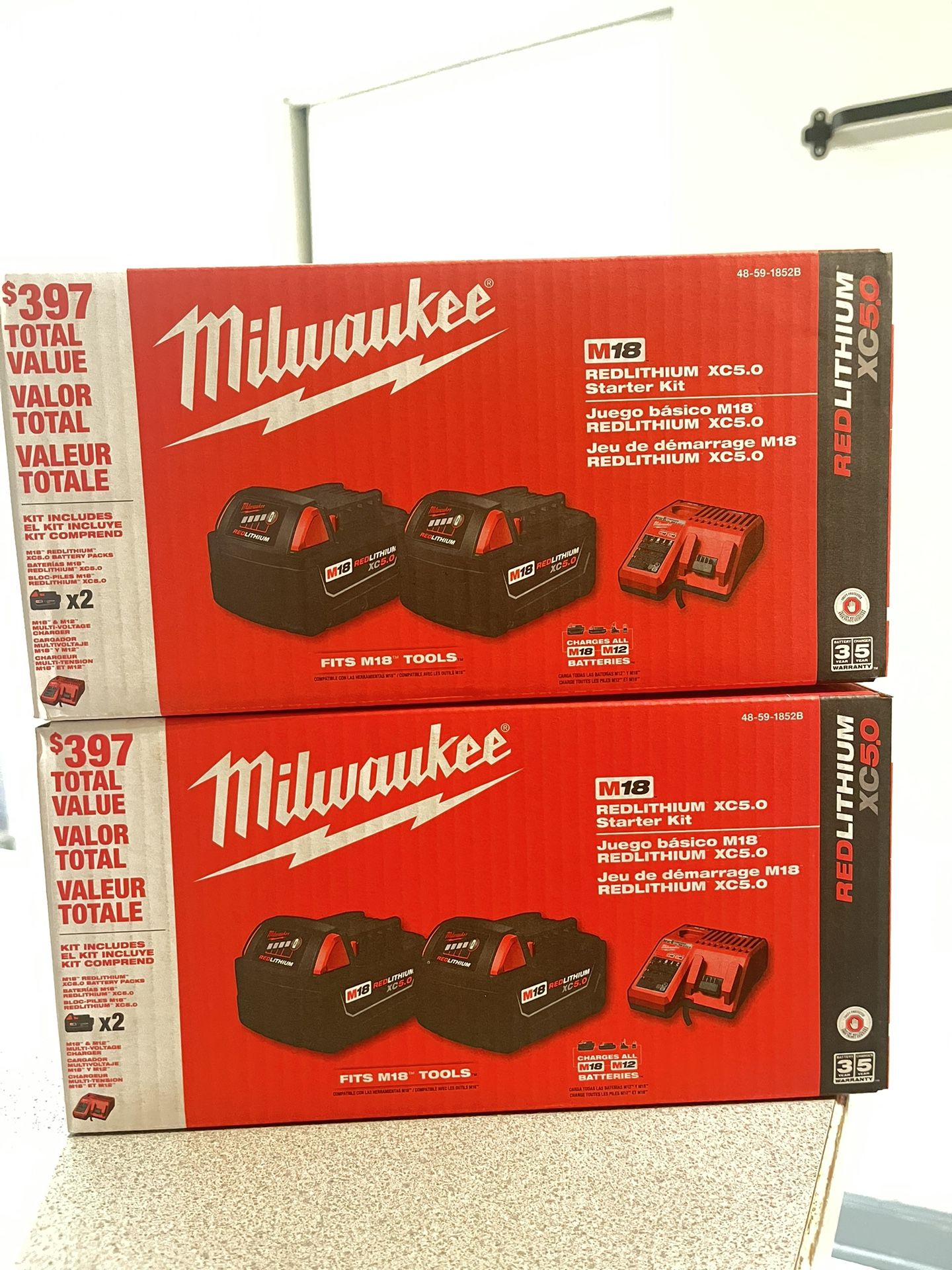 Milwaukee New M18 Batteries Kit $160each 2-5ah Batteries And Charger Per Kit