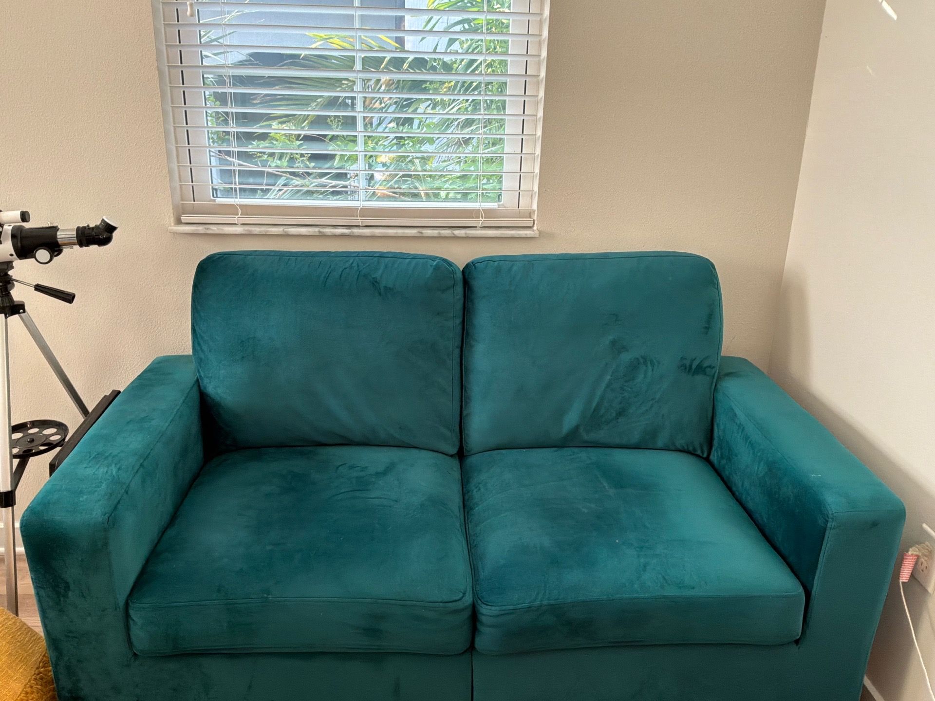 Emerald green two cushion loveseat