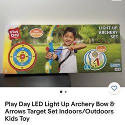 Brand New. Play Day LED Light Up Archery Bow 8
Arrows Target Set Indoors/Outdoors
Kids Toy. 