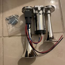 Powerful and loud double trumpet air horn, comes with air compressor attached and relay. Brand New.  Good for cars, boats, motorcycles, rv, atv, campe