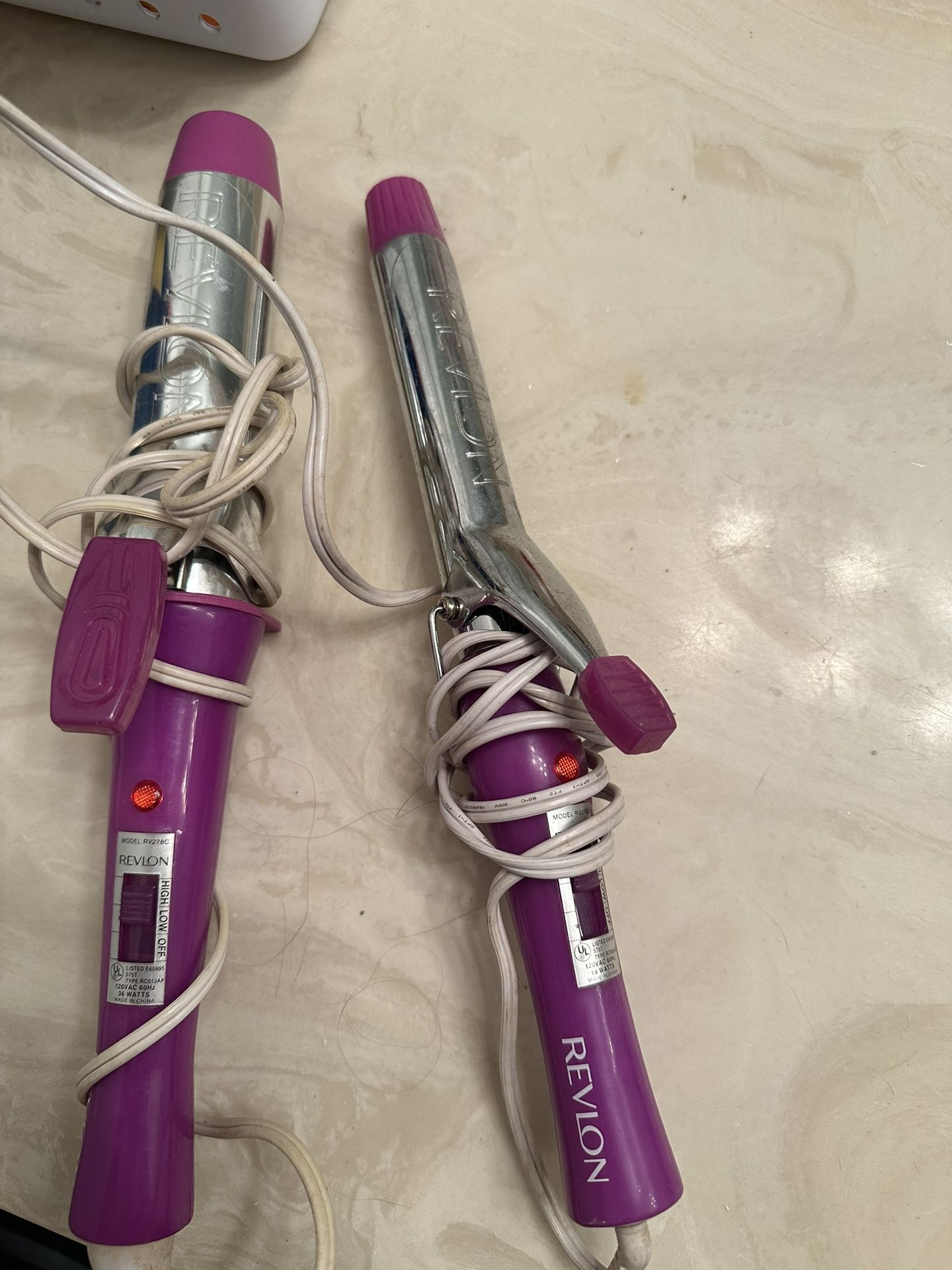 Curling irons And Hair Straightener Used 3/4 Times. Perfect Condition.
