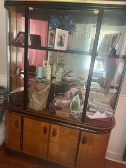vintage curved-glass china cabinet