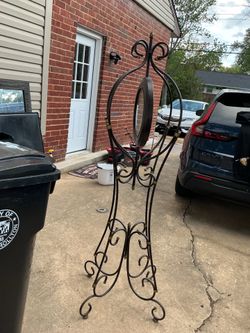 An old antique, floor clock (72” x 28” wide in the bottom and 22” wide up)
