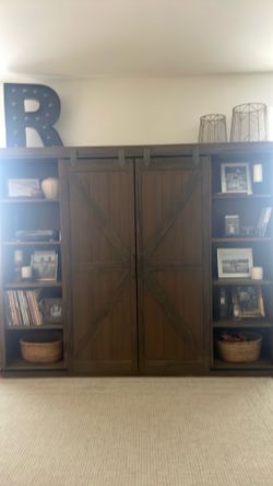 Barn door wall cabinet