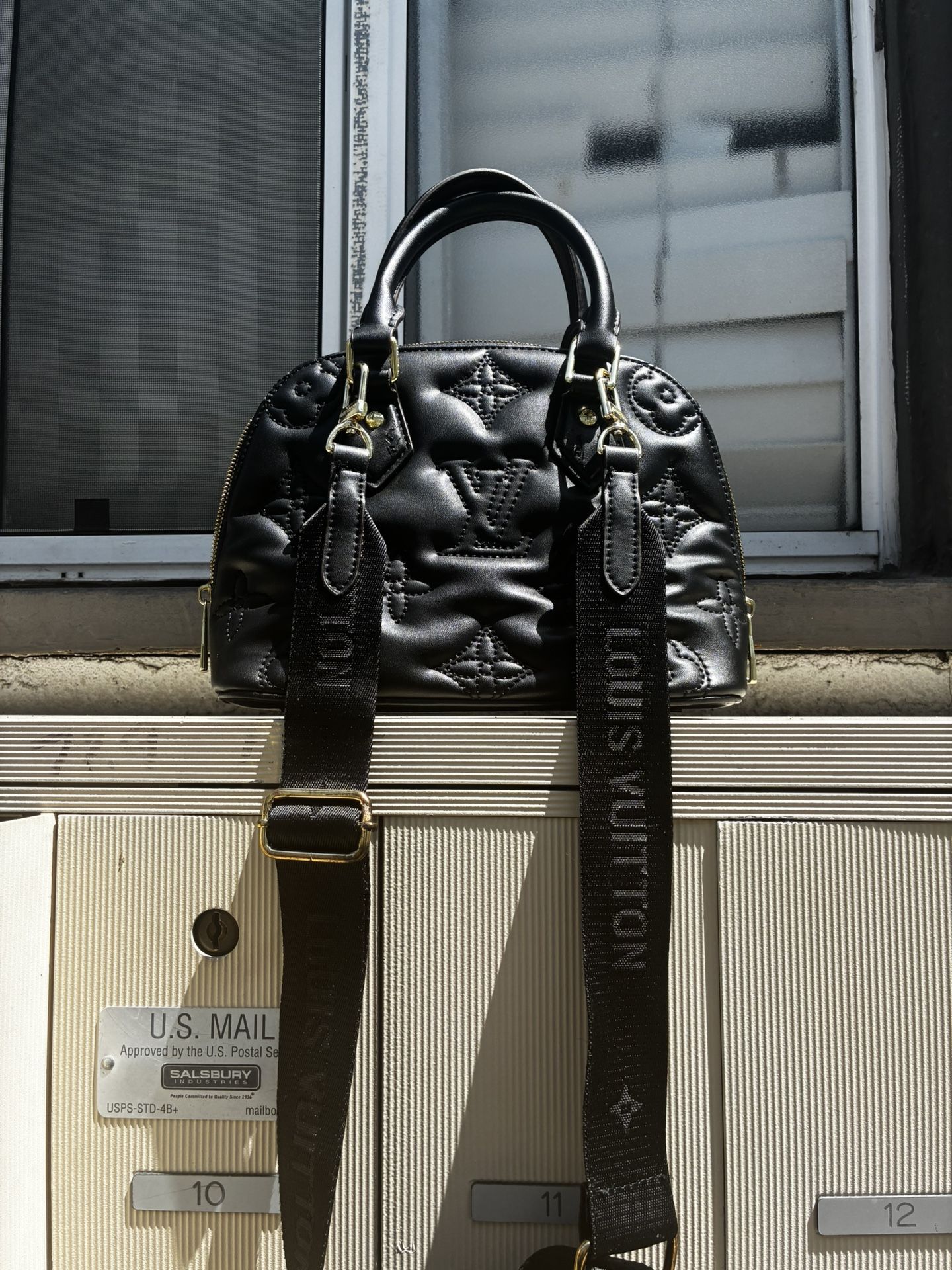Louis Vuitton Alma BB in Monogram Empreinte Puffy Leather