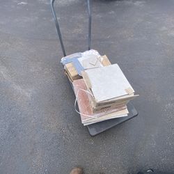 7 Boxes of tile All grey 20-24 In Tile