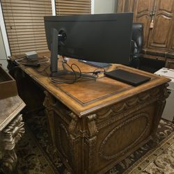 HOOKER FURNITURE PARTNER'S DESK, SEVEN SEAS COLLECTION, EMBOSSED LEATHER TOP, HAND CARVED, GLAZED MEDIUM FINISH, APPROX 77"W X 38"D X 31"H. Desk is us