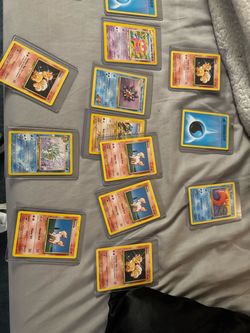 Pokémon Card Lot – 13 Cards in Sleeves