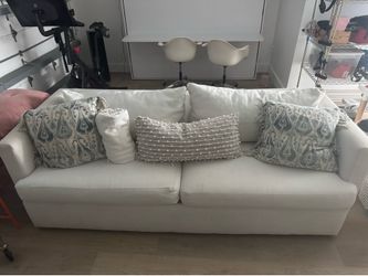 White couch (pillows not included)