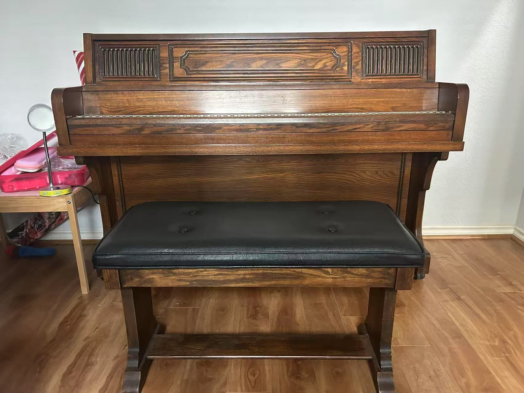 Second hand - hardwood piano with seat