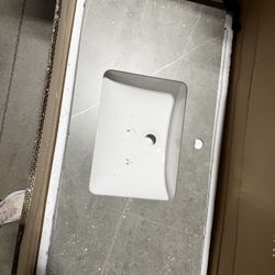 New Corner Damage Brand New Vanity Countertop with Sink Never used, still in original packaging. Beautiful gray stone-look vanity top with a white int