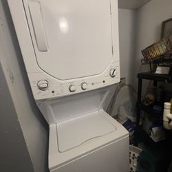GE Electric Stacked Laundry Center with 3.8-cu ft Top load Washer and 5.9-cu ft Dryer ( White )