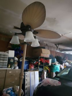 Used – Fair Condition. One fan blade is broken. Lights appear intact. Sold as-i