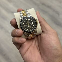 Rolex GMT Master I| 16713 Black Dial 18K Yellow Gold Steel 40mm Box Paper 2006