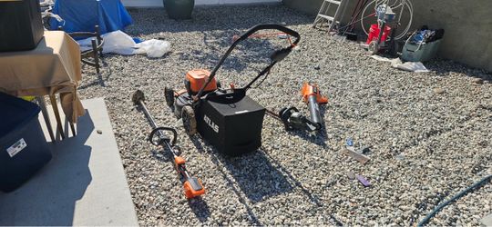 Lawnmower Weedwhacker leaf blower and trimmer
