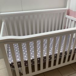 White convertible crib/mattress and rocking chairs