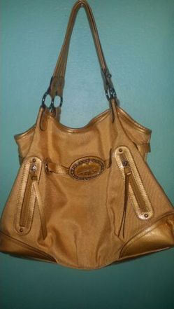 Kathy Zealand gold purse .large size..great condition!