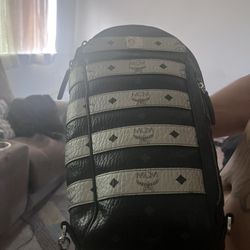 Mcm Sling Backpack 