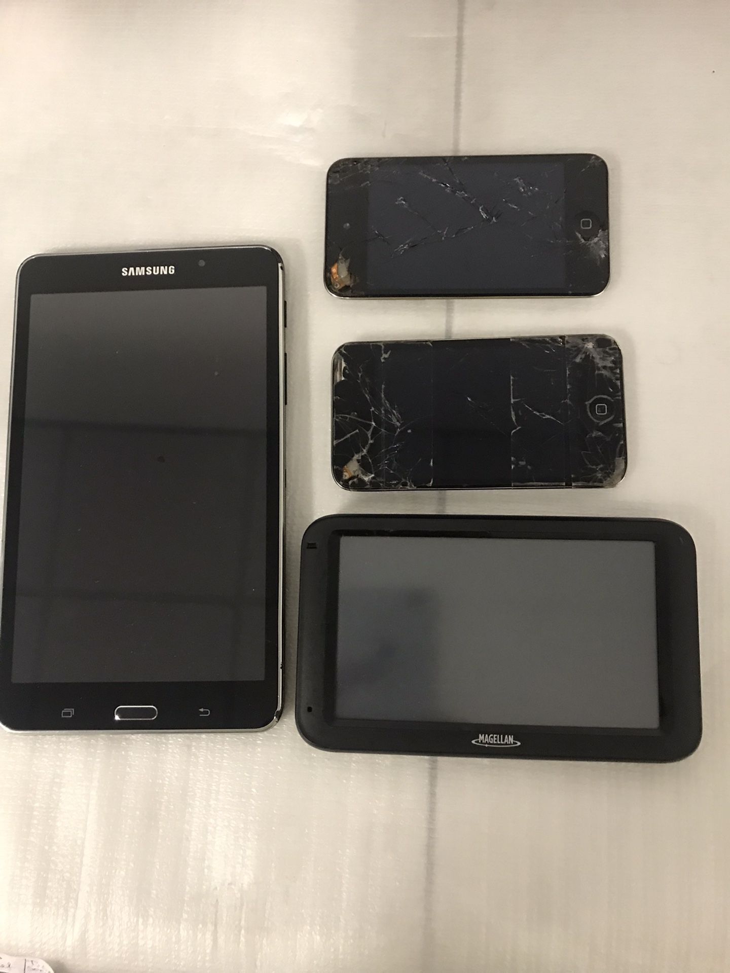 Bundle Of Used iPods, Gps And Tablet 
