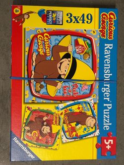 Curious George Ravensburger puzzles 3- 49 piece puzzles