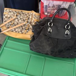 Two coach purses brown one also has a wallet