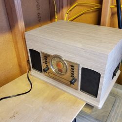 Crosley CR7011A Entertainment Center Bluetooth AM/FM CD/Cassette/Record Player 