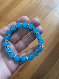 Sky Blue Beaded Bracelet | Diamond-Encrusted Spacer Jewelry  Elegant and simple design featuring fresh sky blue round beads paired with sparkling diam