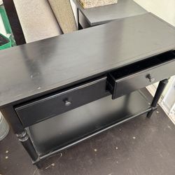 black distressed table with drawers