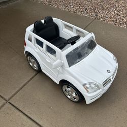 Child’s Power Wheels And Play set 