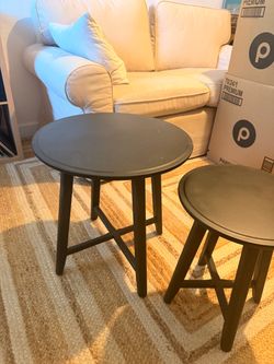 Set of 2. Black round coffee tables.