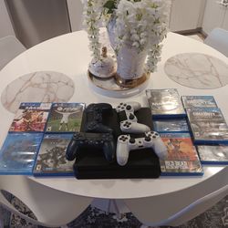 PS4 With Controllers And Games 