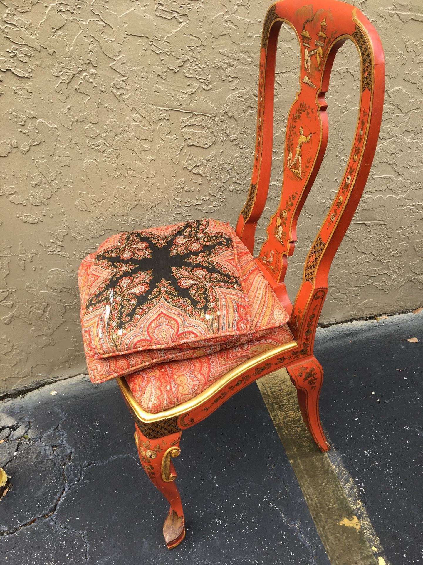 Antique red enamel chair. Unique detail on back & legs.