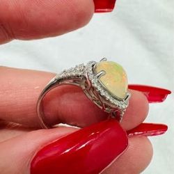 Opal ring - White Gold W/ Diamond setting 