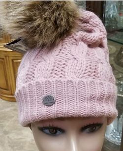 Pink wool hat with fur pom pom