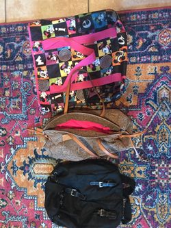 Used. One bag, one purse and one backpack.