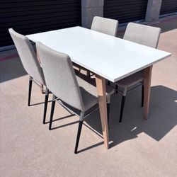 Table and 4 Chairs. Delivery Available.