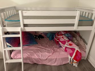 Twin bunk bed set with slide, ladder, and 14” guardrail