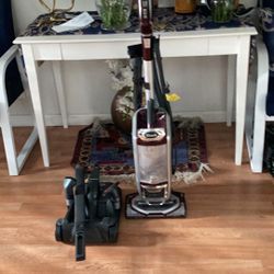 Shark vacuum cleaners works perfect almost new never lose section. All attachment is in include.