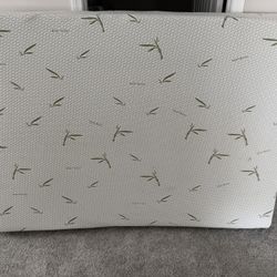 a full-size mattress with a breathable bamboo fabric cover.