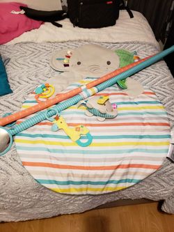 Playmat with toy attachments -