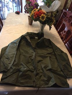 Brand new military raincoat dark green color size large with collar or hood, Hood can be hidden inside the collar
