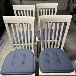 Four White Chairs