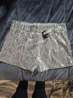White with silver sqn shorts size medium