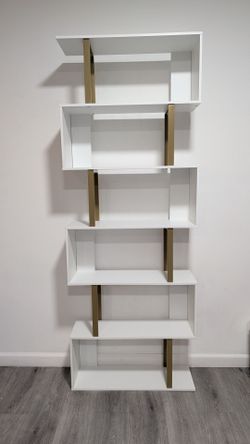 White and gold bookshelf