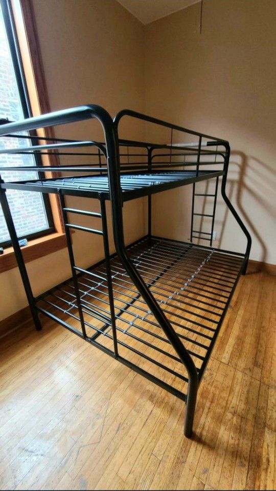 DHP Twin Full Bunk Bed With Metal Frame And Ladder, Black