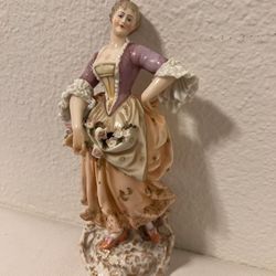 antique ceramic figurine of a woman in a garden, height 8.1/2x3.1