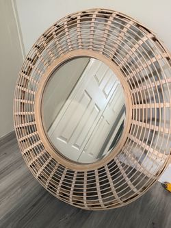 Circular wooden mirror