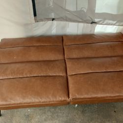 In Like New Condition Leather Futon