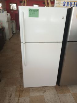 GE Refrigerator white super clean excellent . Warranty , Delivery available 2203 Fowler st. Ft. Myers 33901