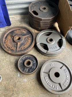 1$ a pound Barbell Round Weights